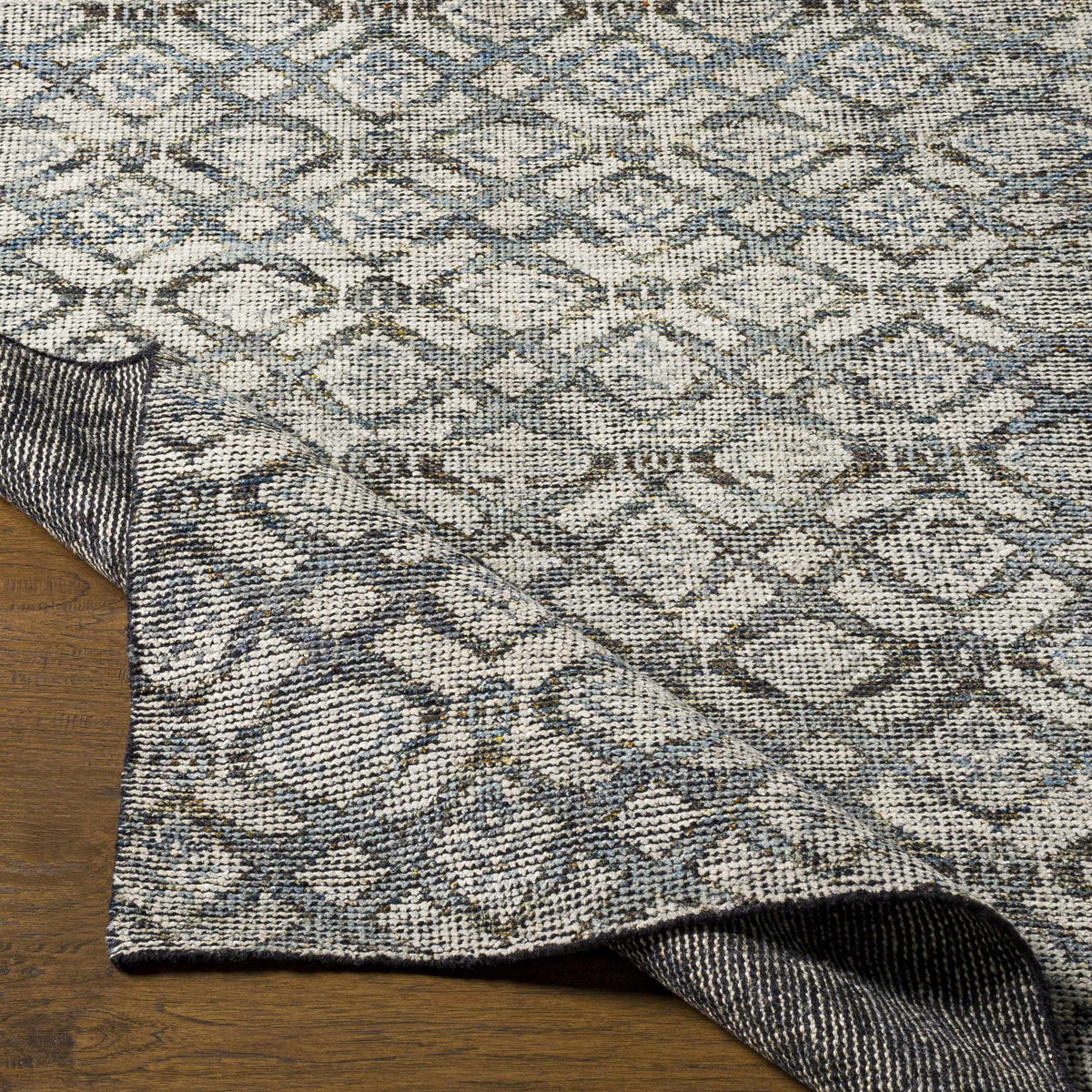 Maudsland Area Rug - Clearance