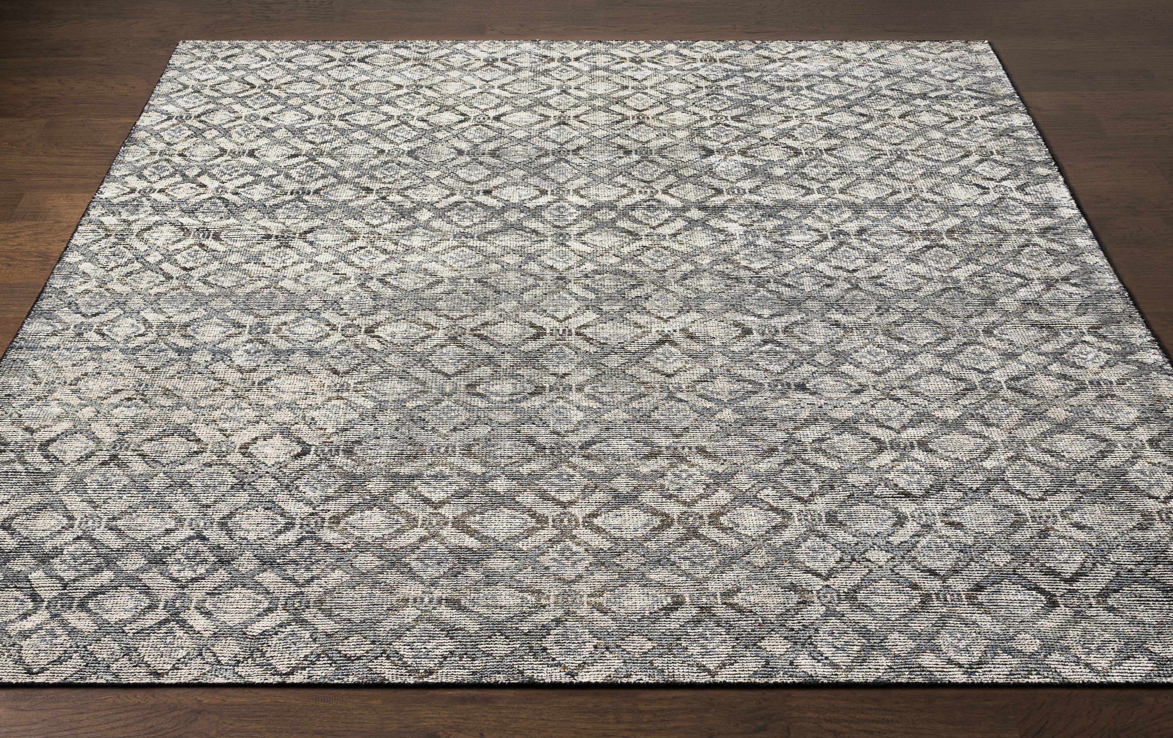 Maudsland Area Rug - Clearance