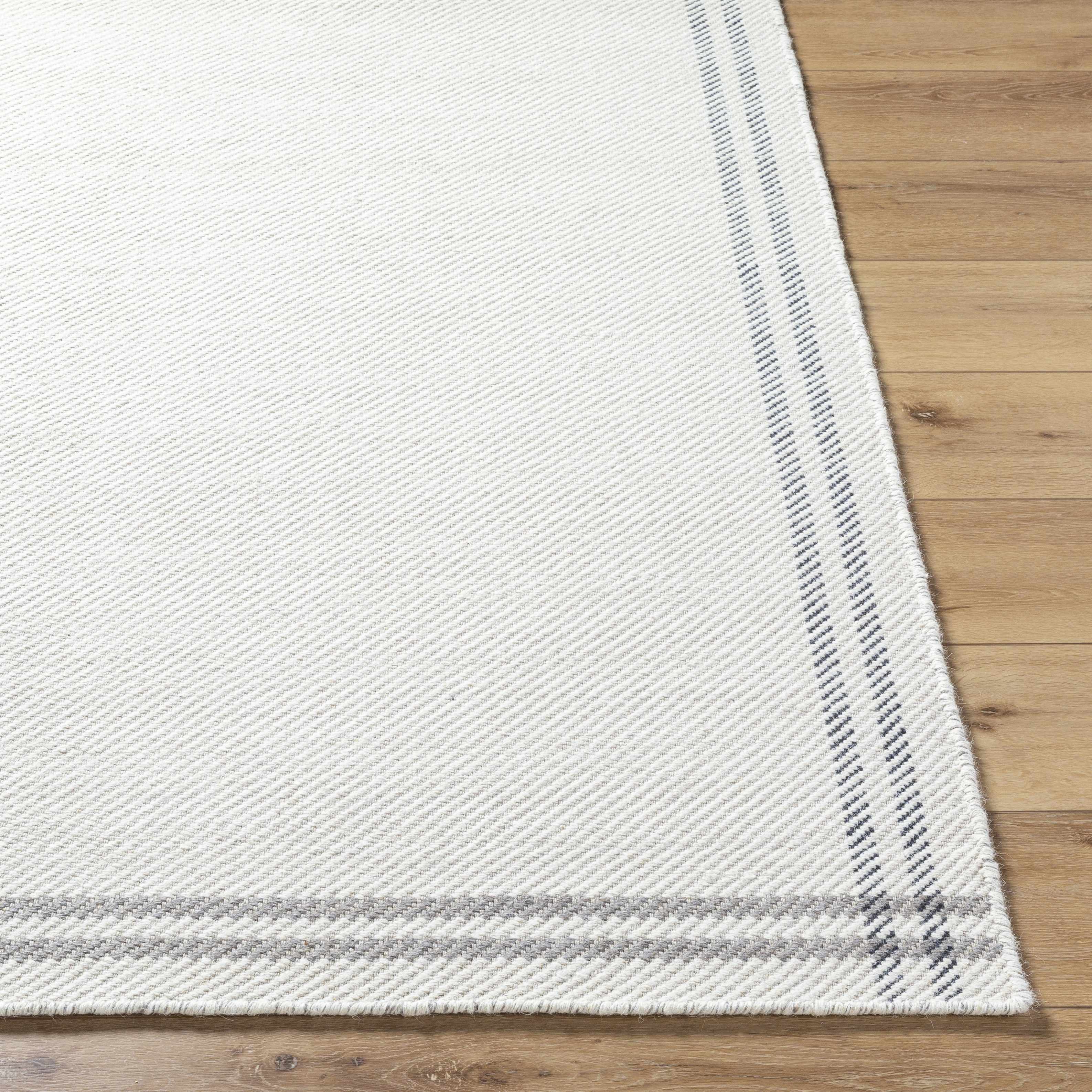 Nimue Cream & Charcoal Bordered Area Rug - Clearance