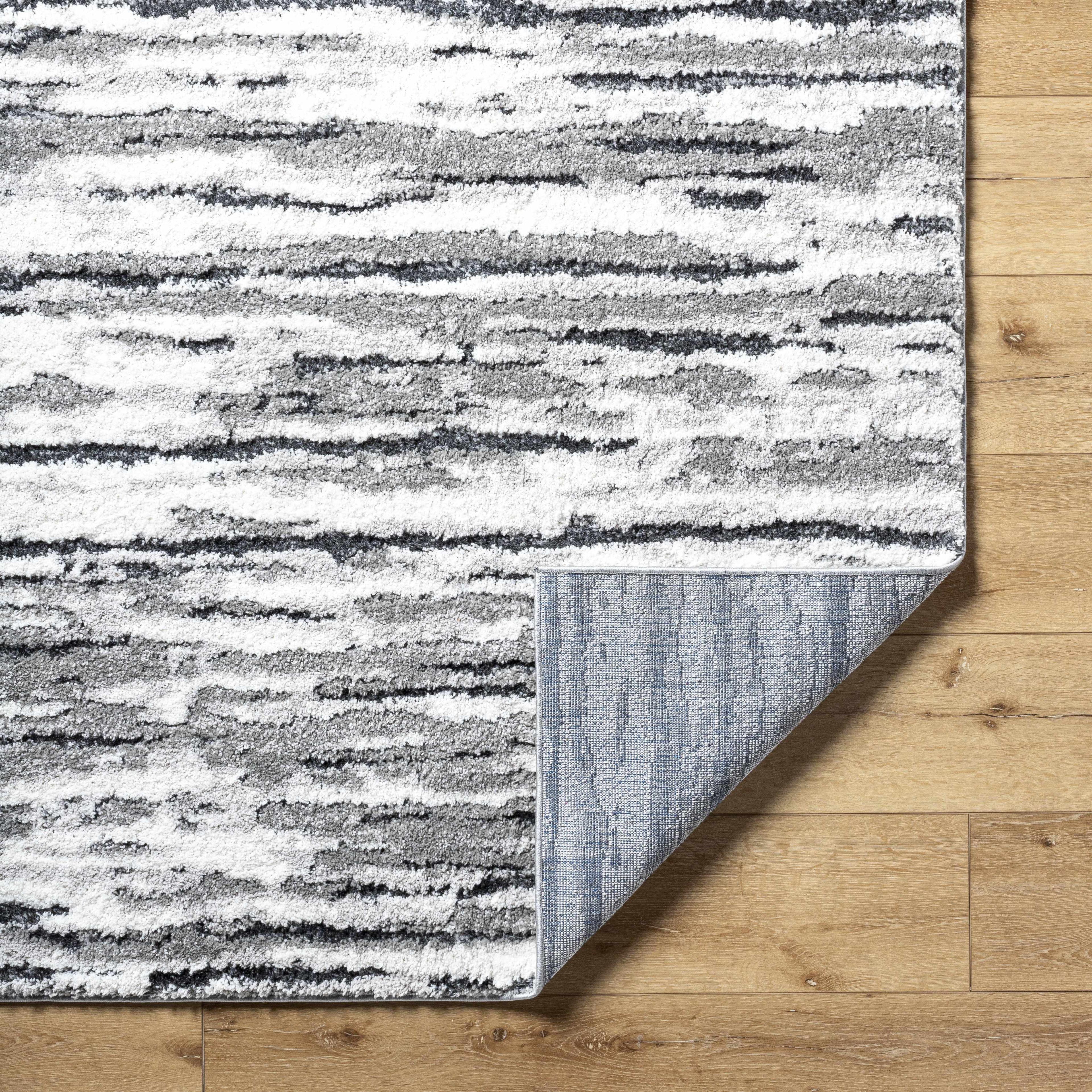 Vembo Area Rug - Clearance