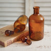 Set of Two Amber Glass Bottles with Stoppers