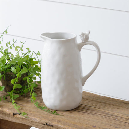 CERAMIC PITCHER WITH BIRD ON HANDLE