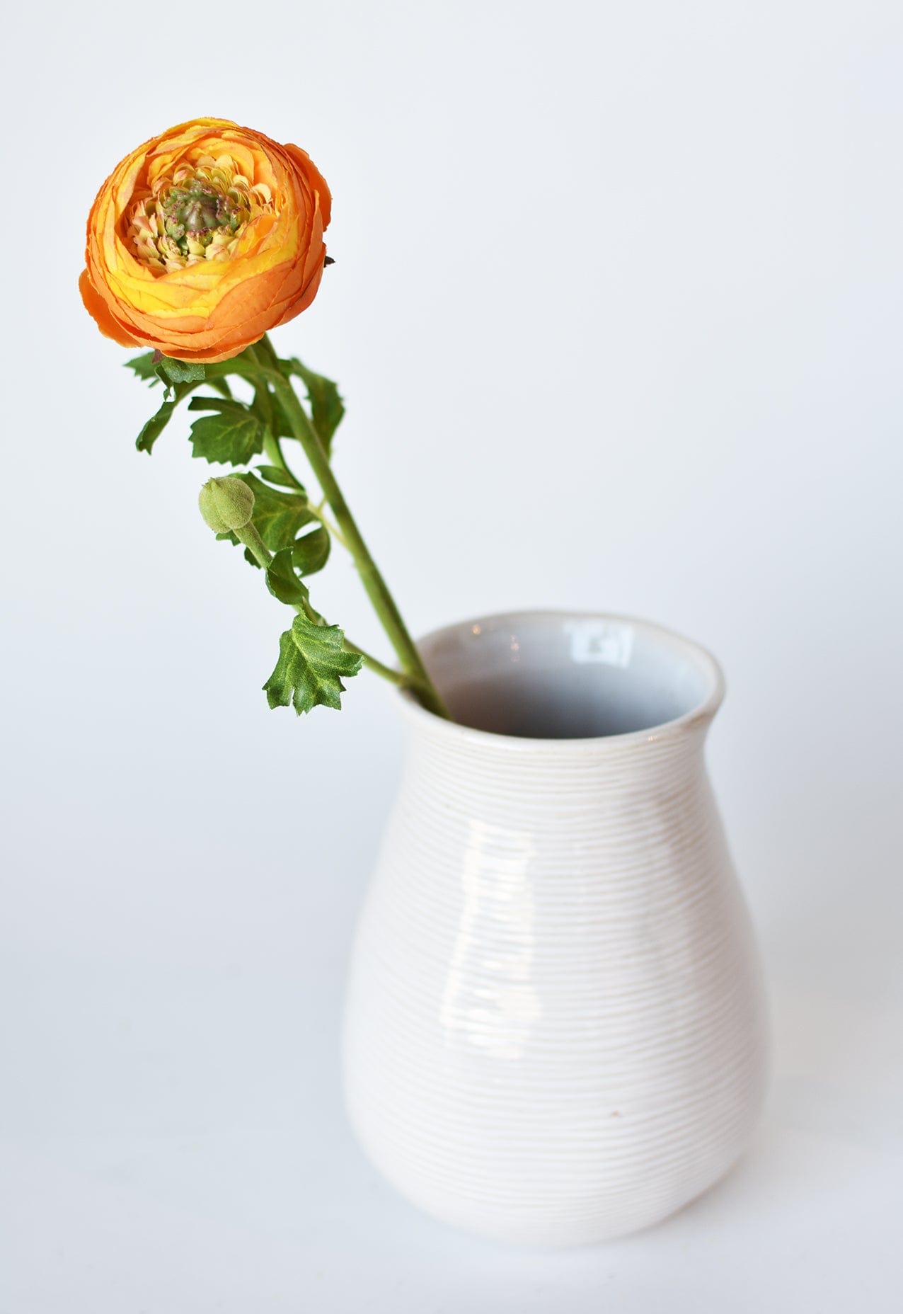 13" Faux Orange Ranunculus Stem