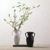 NATURAL RIMMED ONYX URN VASE