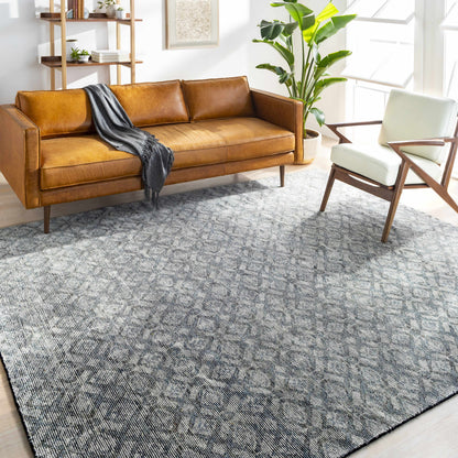 Maudsland Area Rug - Clearance