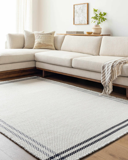 Nimue Cream &amp; Blue Bordered Area Rug - Clearance