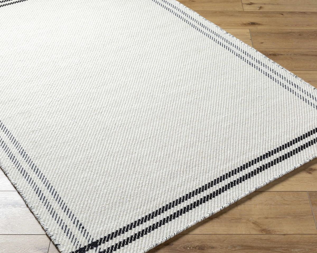Nimue Cream &amp; Blue Bordered Area Rug - Clearance