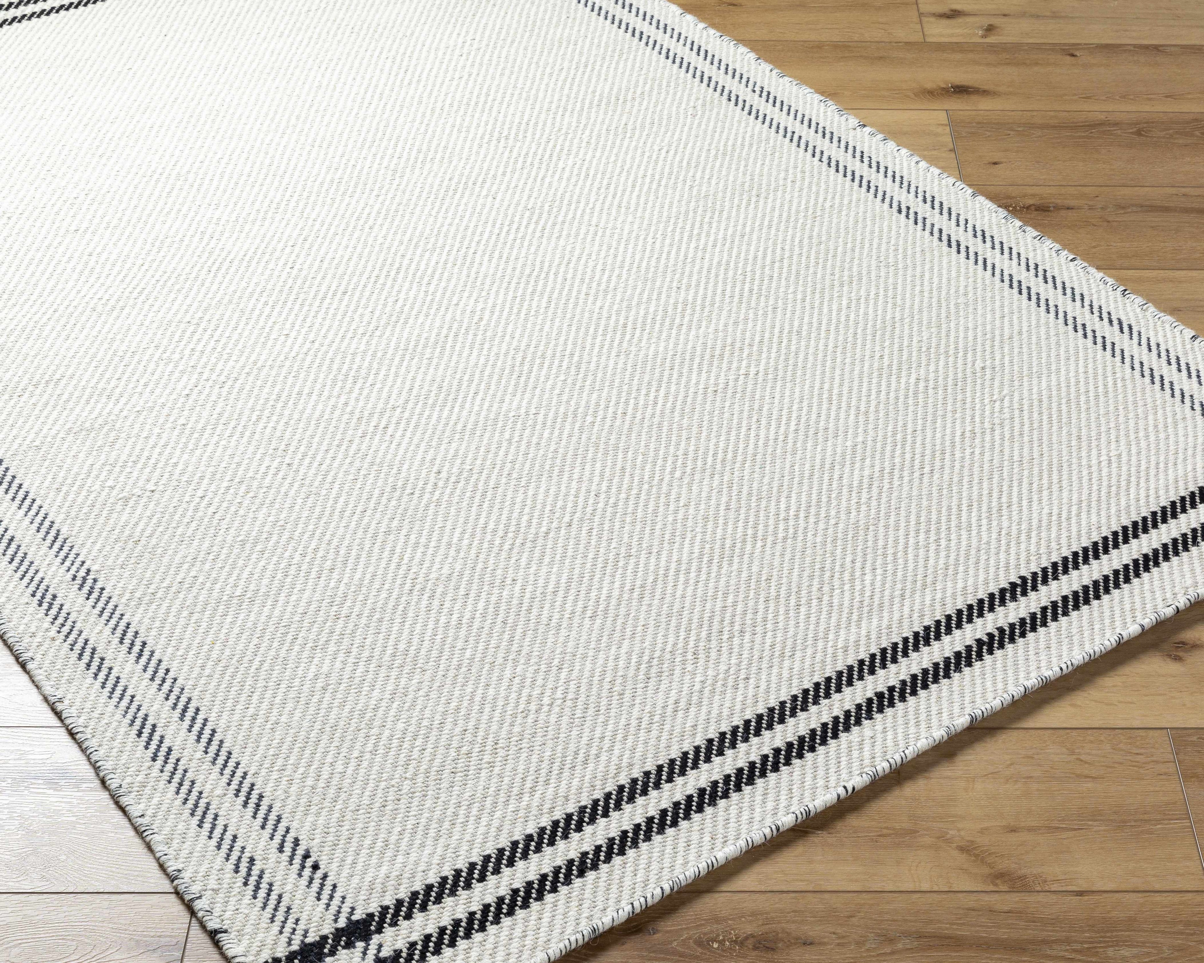 Nimue Cream &amp; Blue Bordered Area Rug - Clearance