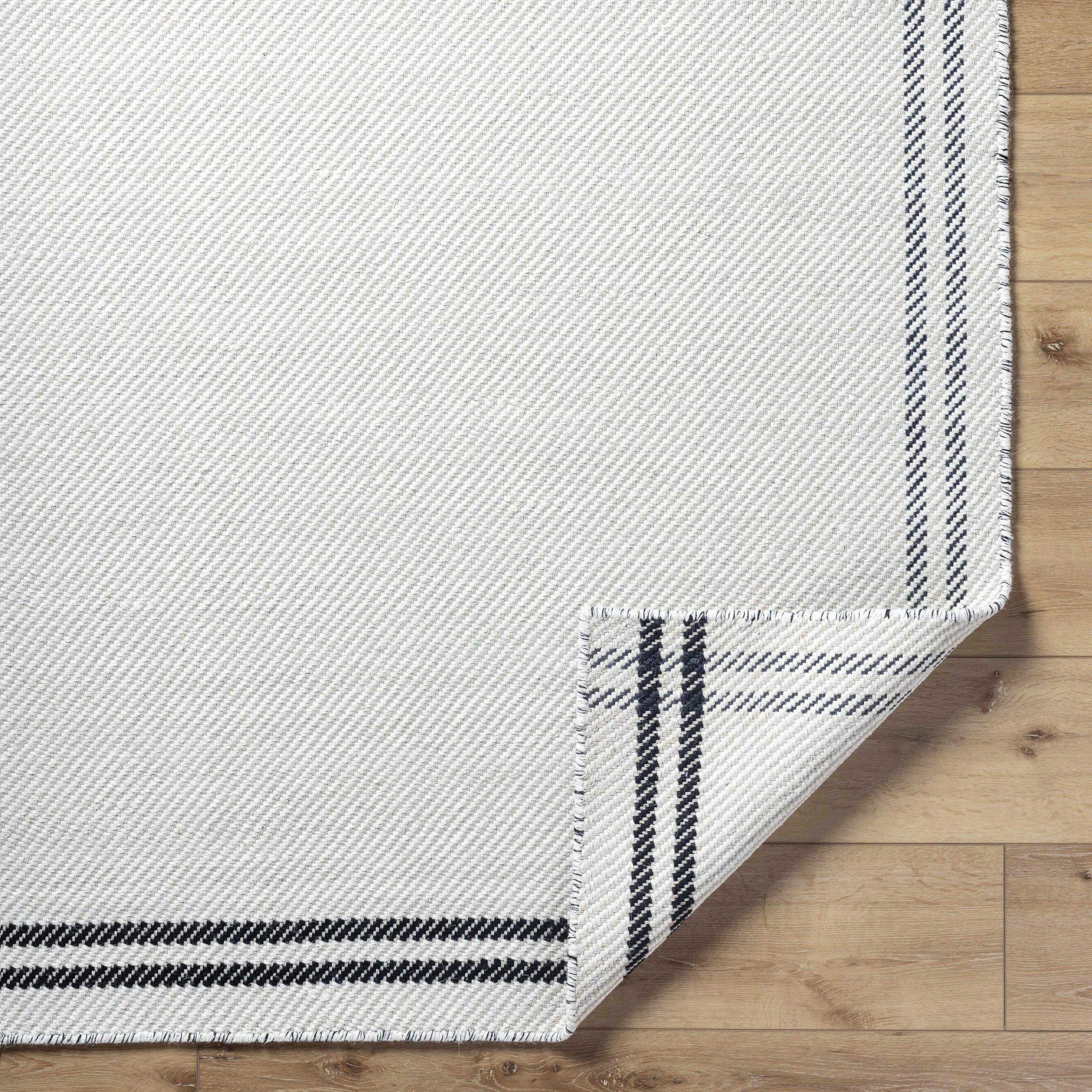 Nimue Cream &amp; Blue Bordered Area Rug - Clearance