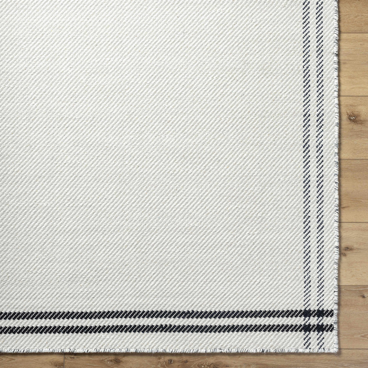 Nimue Cream &amp; Blue Bordered Area Rug - Clearance