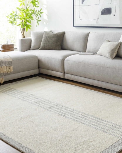 Ande Cream Area Rug - Clearance